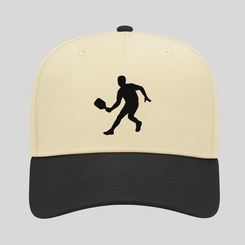 Beige and black cap with a black silhouette of a person on a gray background